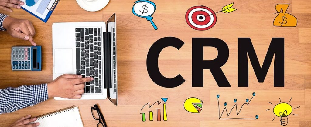 CRM Business Customer CRM Management Analysis Service Concept Business team at work with financial reports and a laptop